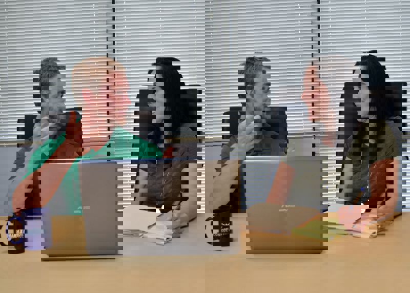 Project managers Stephanie Yost and John Pezzella discuss a project